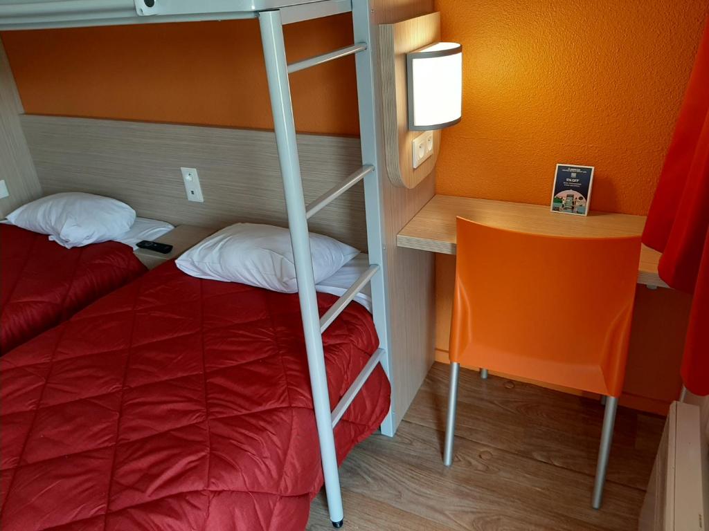 Postel nebo postele na pokoji v ubytování Premiere Classe Carcassonne