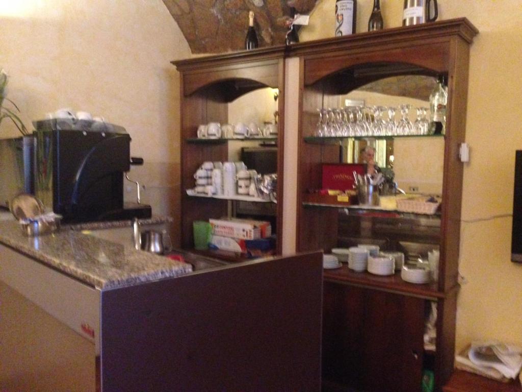 Kuchyň nebo kuchyňský kout v ubytování Hotel Filippeschi