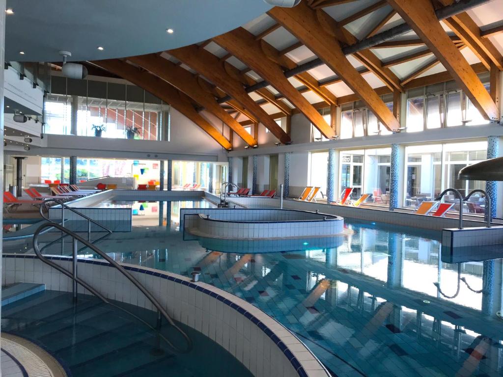 The swimming pool at or close to Relax and Spa - DeLux Apartman