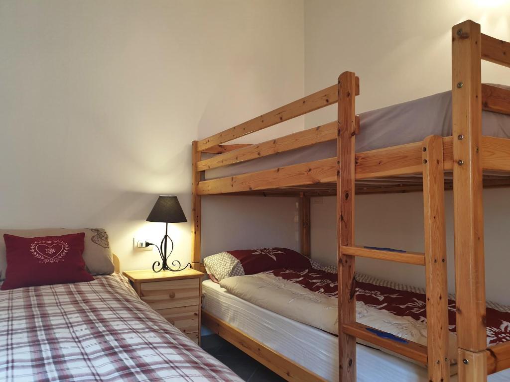 Postel nebo postele na pokoji v ubytování B&B Ai Larici
