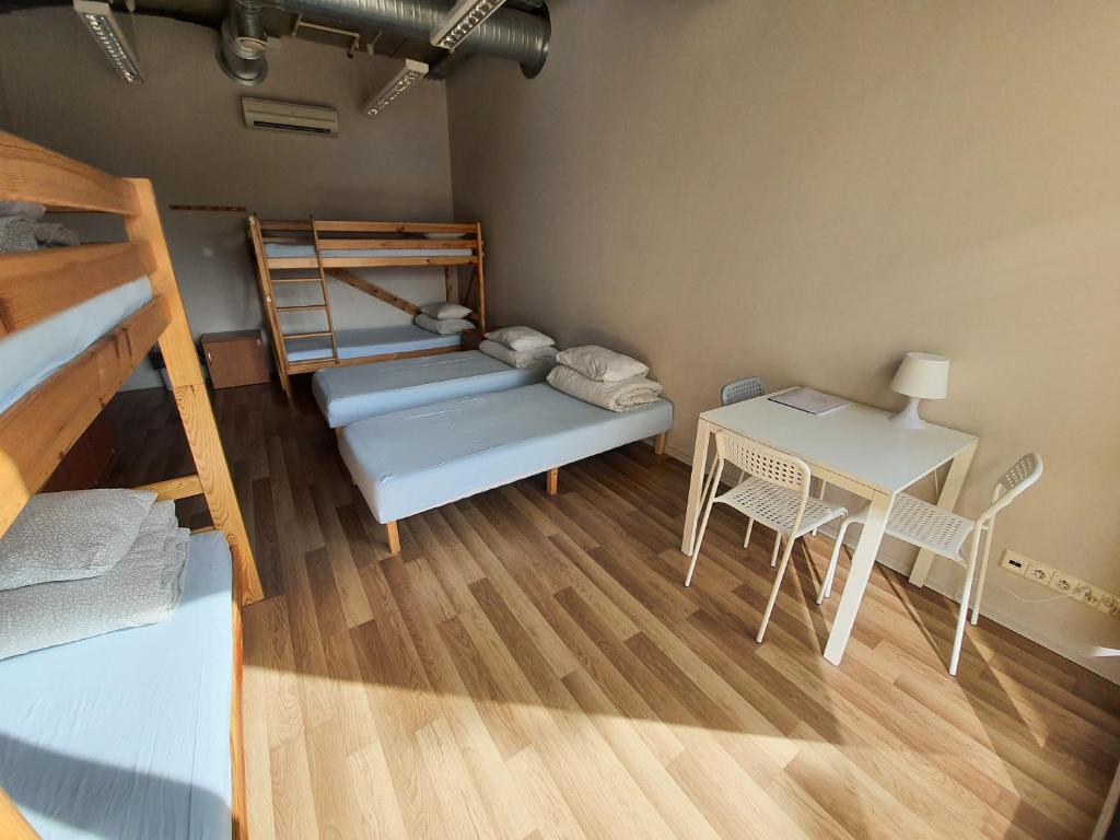 Postel nebo postele na pokoji v ubytování Sea Hostel