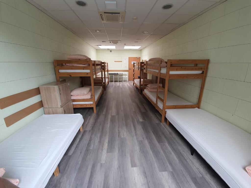 Postel nebo postele na pokoji v ubytování Sea Hostel