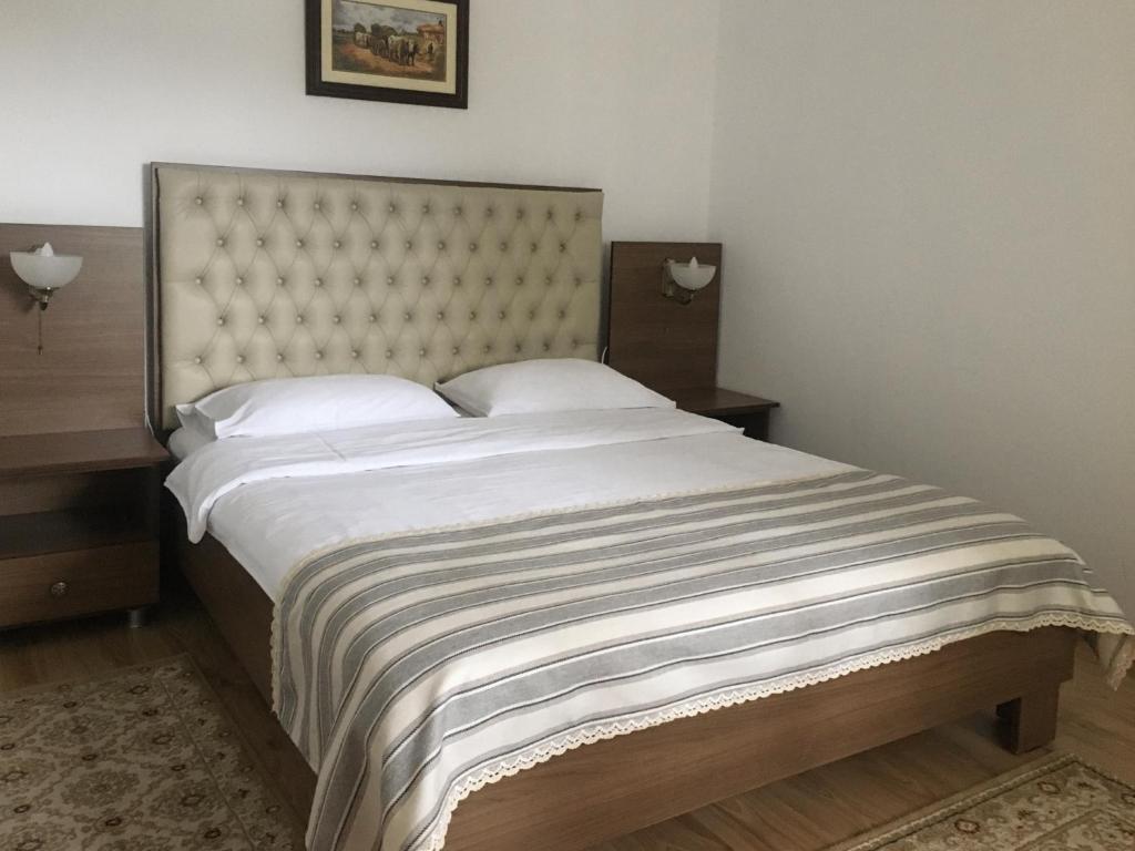 Postel nebo postele na pokoji v ubytování Pensiunea Encian