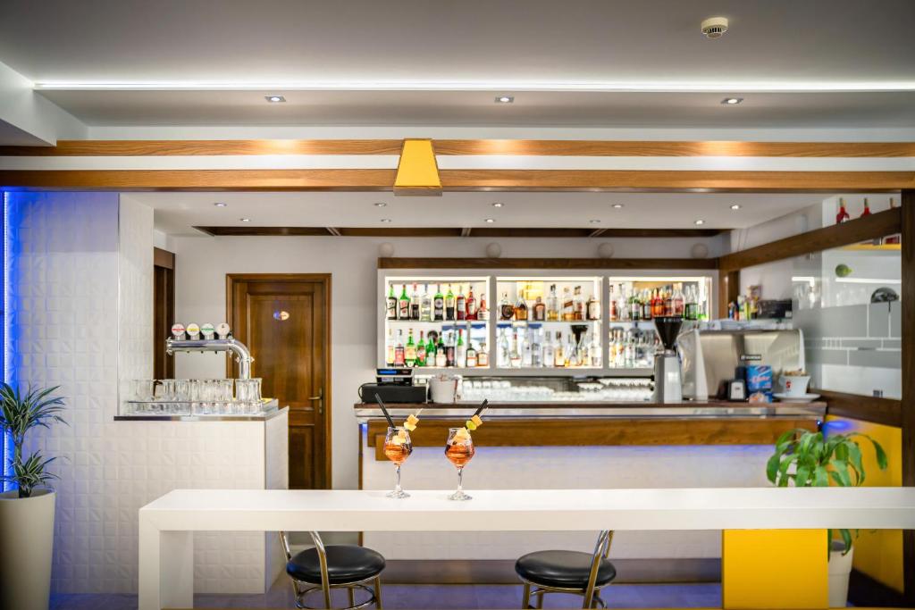 Nápoje v ubytování Hotel Coralba