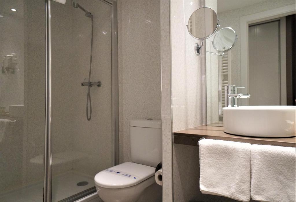 Koupelna v ubytování Hotel & Spa Xalet Bringue