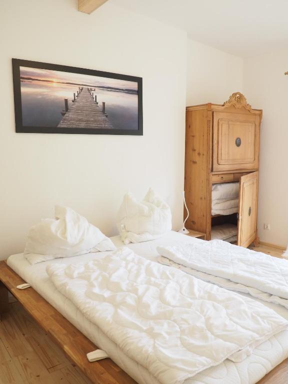 Postel nebo postele na pokoji v ubytování Apartments Sonne am Sund