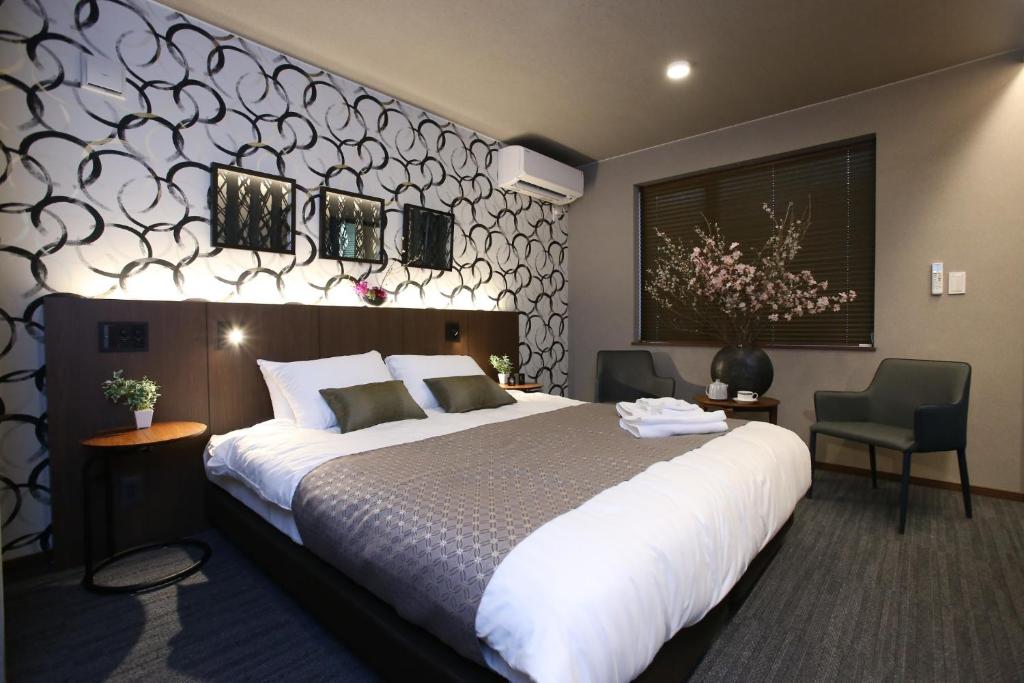 Säng eller sängar i ett rum på Sapporo - House - Vacation STAY 88298
