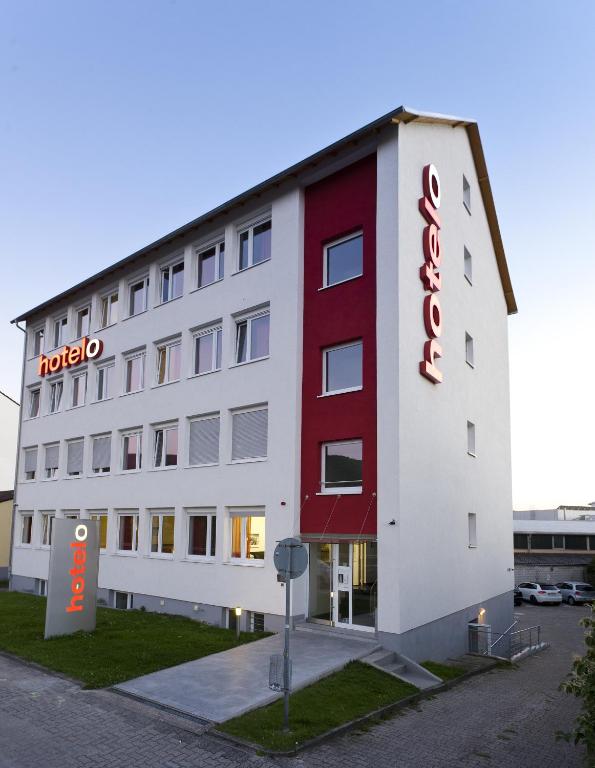 a hotel with a sign on the side of it at hotelo Heidelberg in Heidelberg