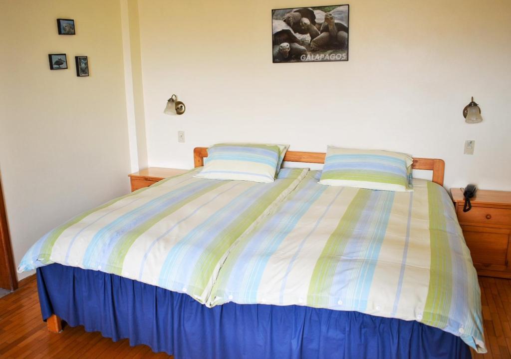 Postel nebo postele na pokoji v ubytování Hotel Rincon Aleman