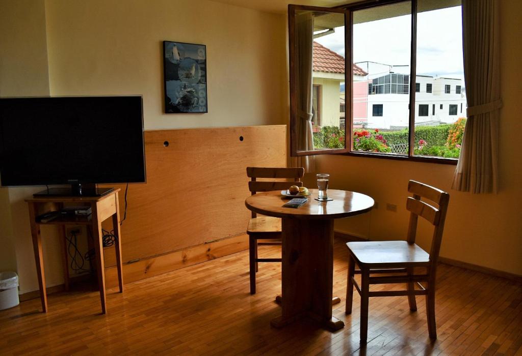 TV a/nebo společenská místnost v ubytování Hotel Rincon Aleman