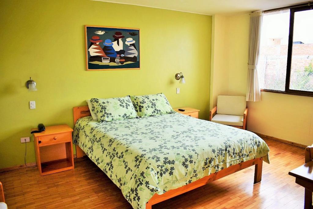 Postel nebo postele na pokoji v ubytování Hotel Rincon Aleman