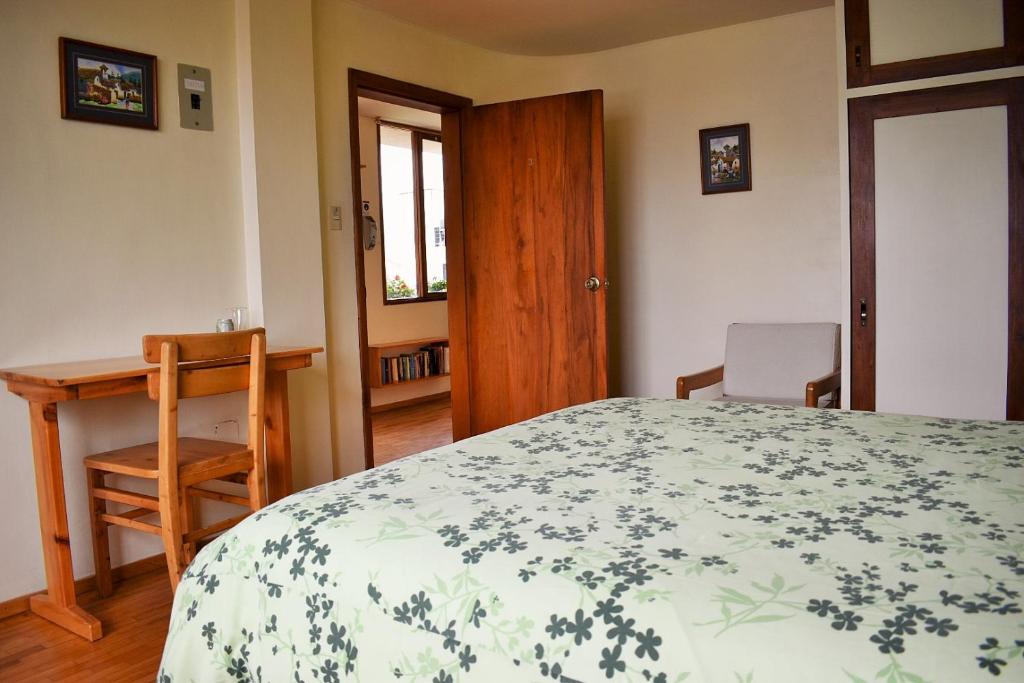 Postel nebo postele na pokoji v ubytování Hotel Rincon Aleman