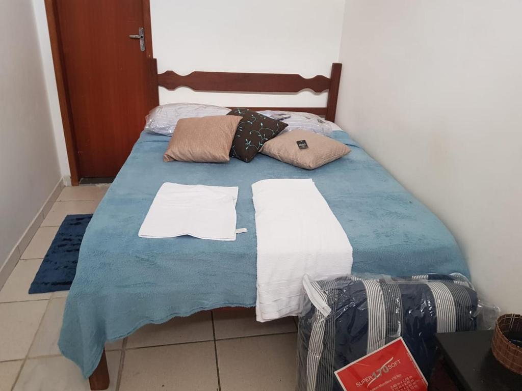 Posteľ alebo postele v izbe v ubytovaní Estadia Confortável AP 102