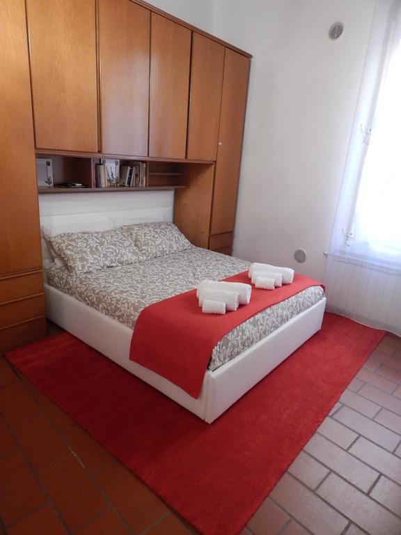 Łóżko lub łóżka w pokoju w obiekcie La casa del Centro