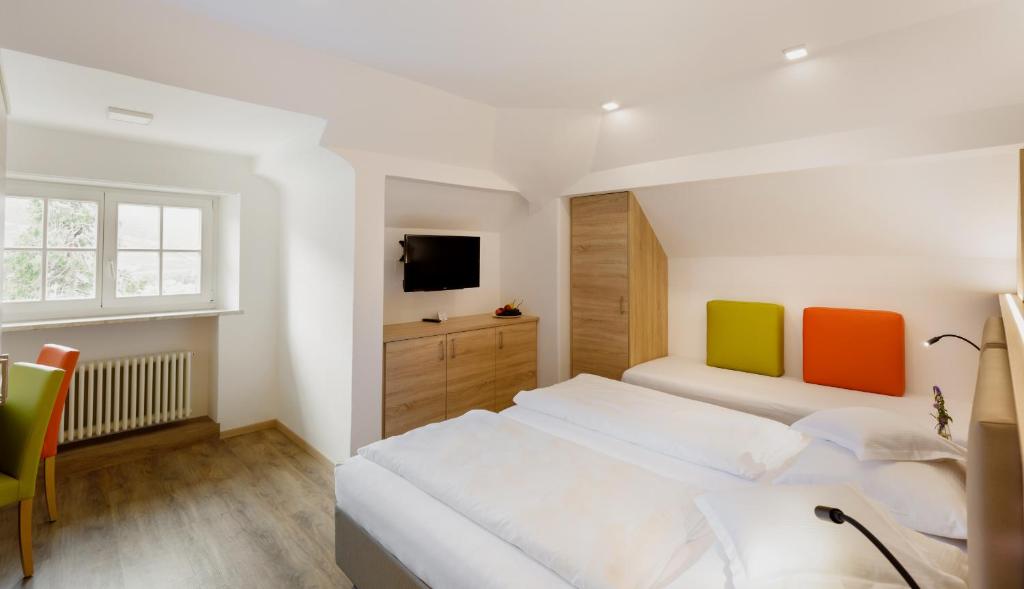 Postel nebo postele na pokoji v ubytování Hotel Kolping