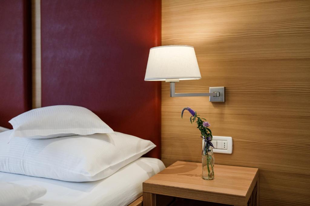Postel nebo postele na pokoji v ubytování Hotel Kolping