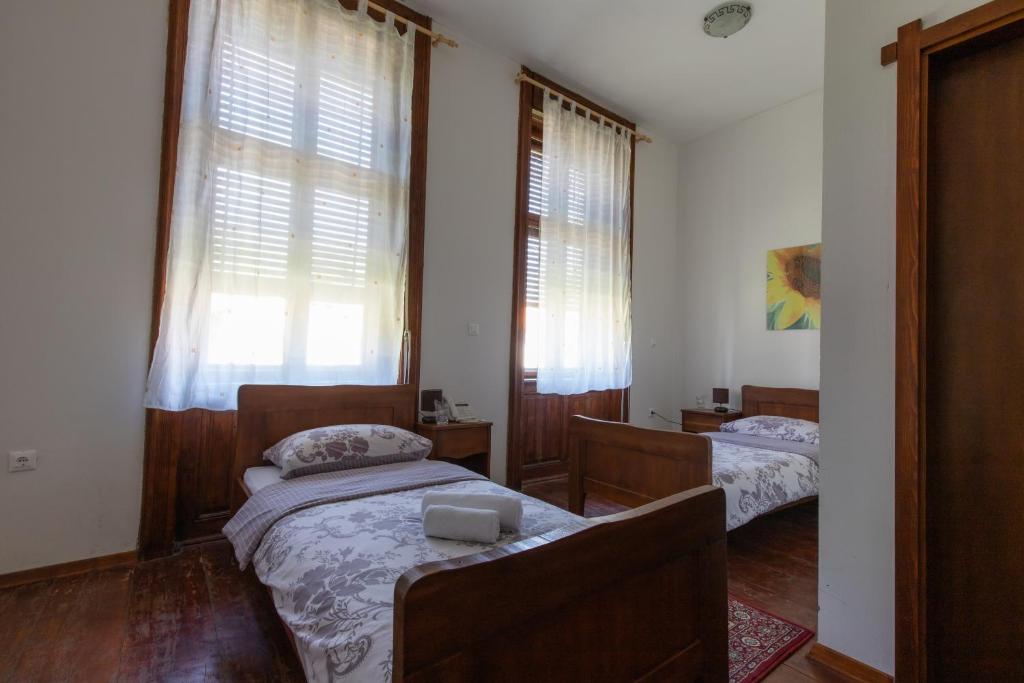 Postel nebo postele na pokoji v ubytování Hotel Lug