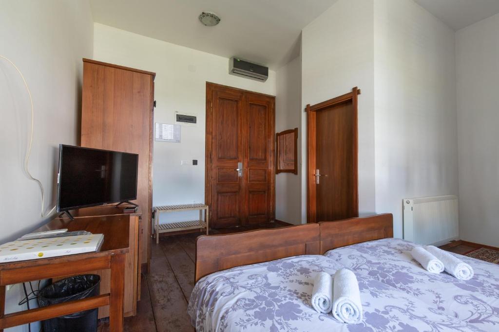 Postel nebo postele na pokoji v ubytování Hotel Lug