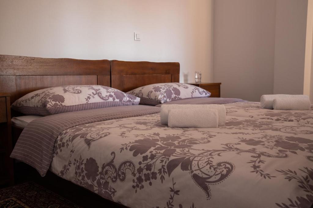 Postel nebo postele na pokoji v ubytování Hotel Lug