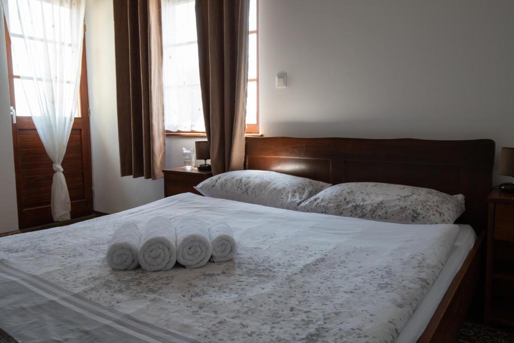 Postel nebo postele na pokoji v ubytování Hotel Lug