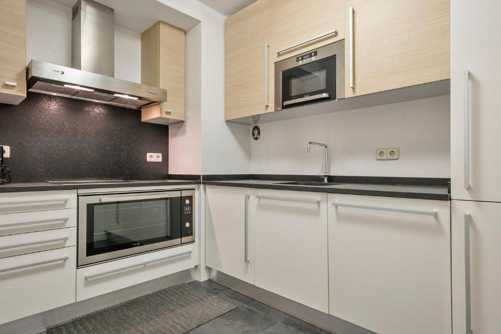 Kuchyň nebo kuchyňský kout v ubytování Luderna - Apartamento con terraza Barrados
