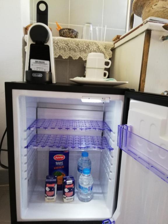 Kuchyňa alebo kuchynka v ubytovaní La Solana, alojamiento y alfarería