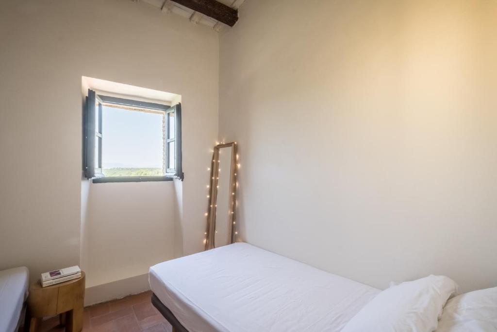 Postel nebo postele na pokoji v ubytování Flateli Vilopriu