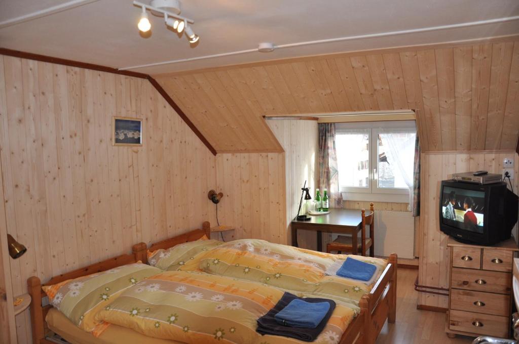 Postel nebo postele na pokoji v ubytování Gasthaus Waldheim