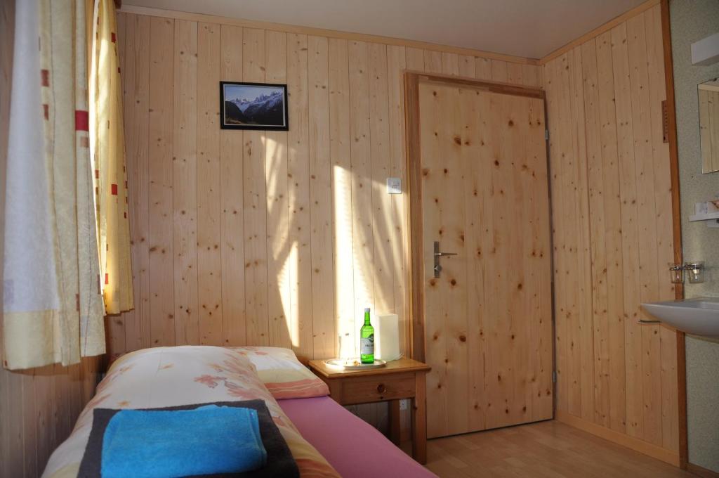 Postel nebo postele na pokoji v ubytování Gasthaus Waldheim