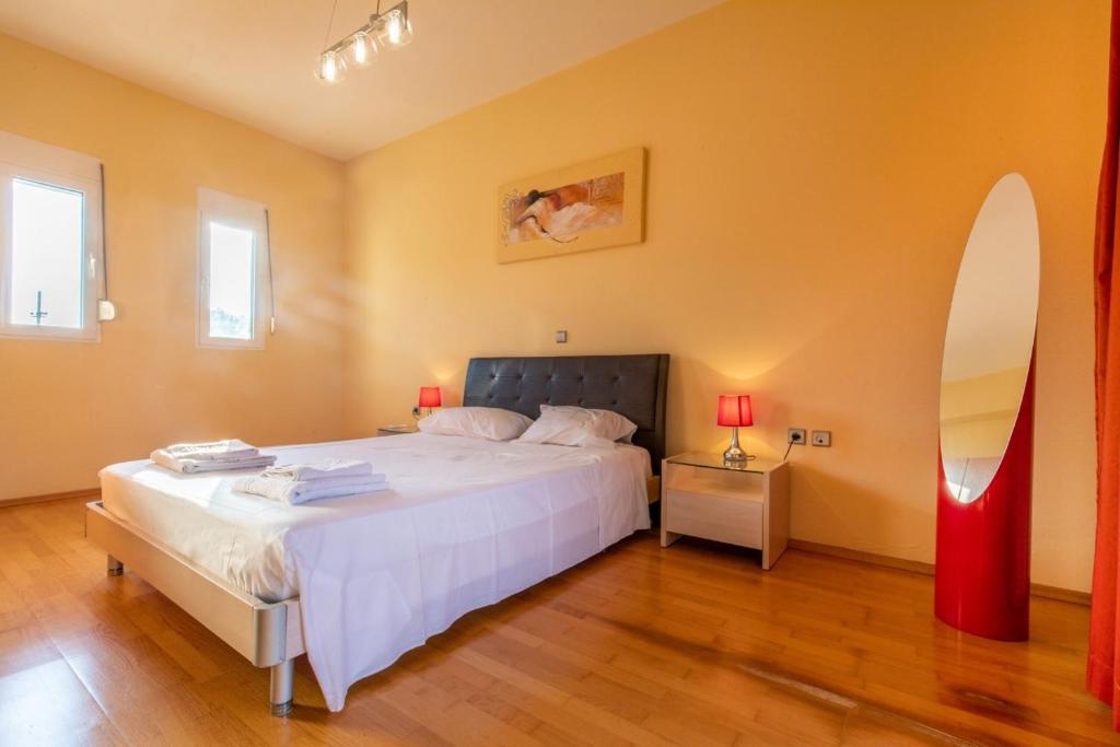Łóżko lub łóżka w pokoju w obiekcie Rose Garden House