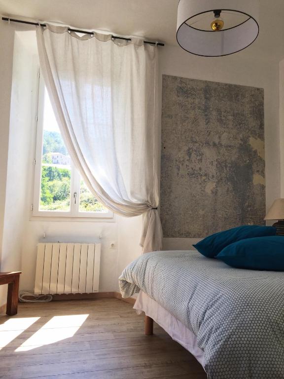 Postel nebo postele na pokoji v ubytování Casa Mariana