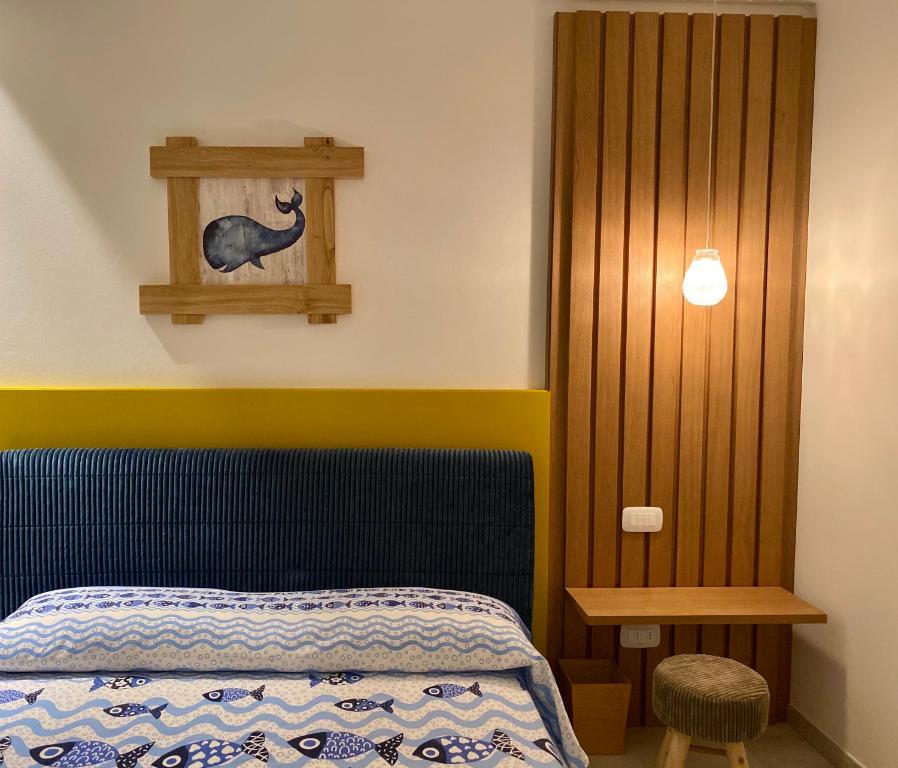 Postel nebo postele na pokoji v ubytování Mare e marmellata