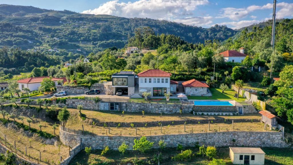 an aerial view of a house on a hill at Casa d' Avó Marcelina - Casas de Campo in Arcos de Valdevez