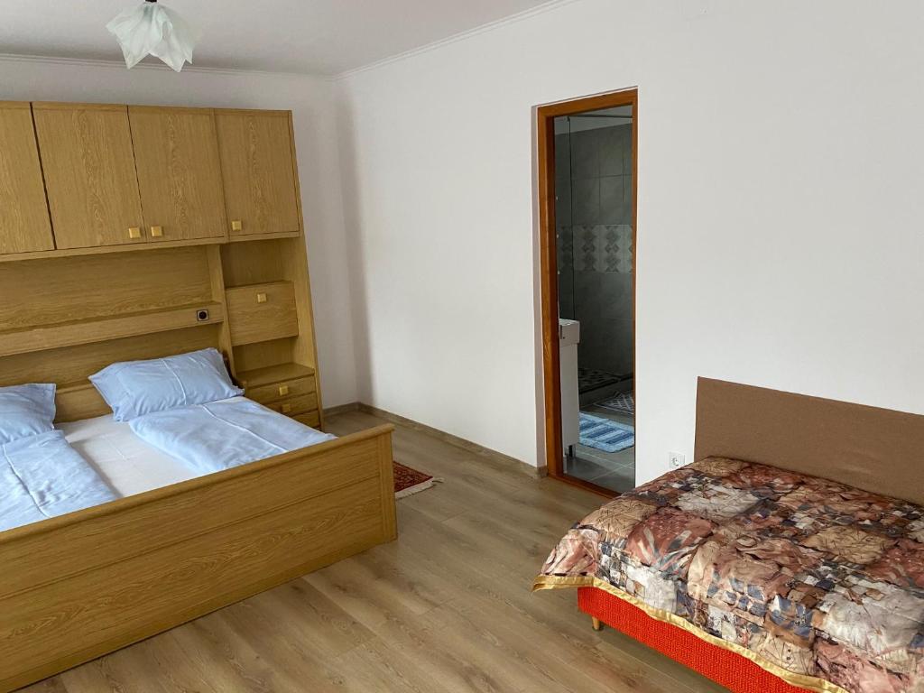 Postel nebo postele na pokoji v ubytování Casa Katona