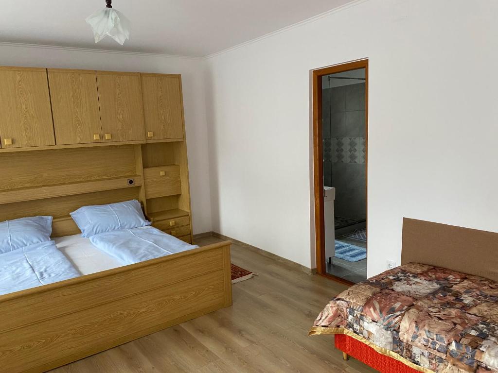 Postel nebo postele na pokoji v ubytování Casa Katona