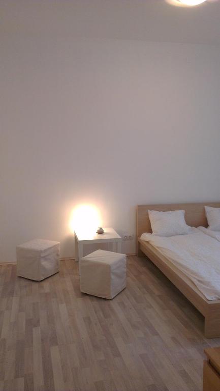 Posteľ alebo postele v izbe v ubytovaní Apartman 4 you