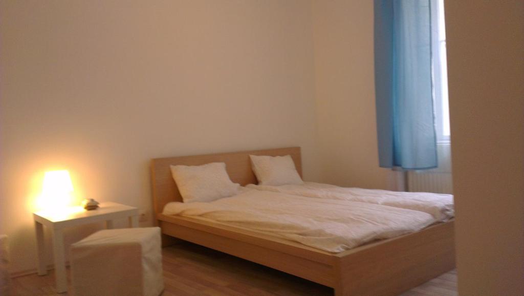 Posteľ alebo postele v izbe v ubytovaní Apartman 4 you