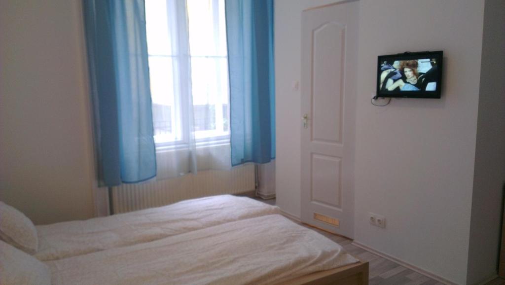 Posteľ alebo postele v izbe v ubytovaní Apartman 4 you