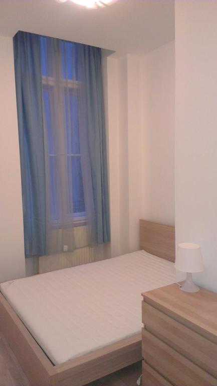 Posteľ alebo postele v izbe v ubytovaní Apartman 4 you