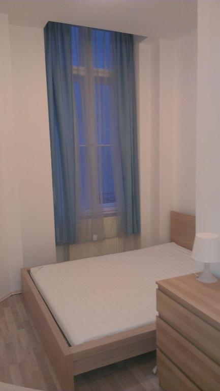 Posteľ alebo postele v izbe v ubytovaní Apartman 4 you