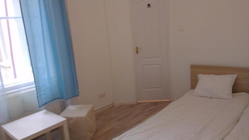 Posteľ alebo postele v izbe v ubytovaní Apartman 4 you