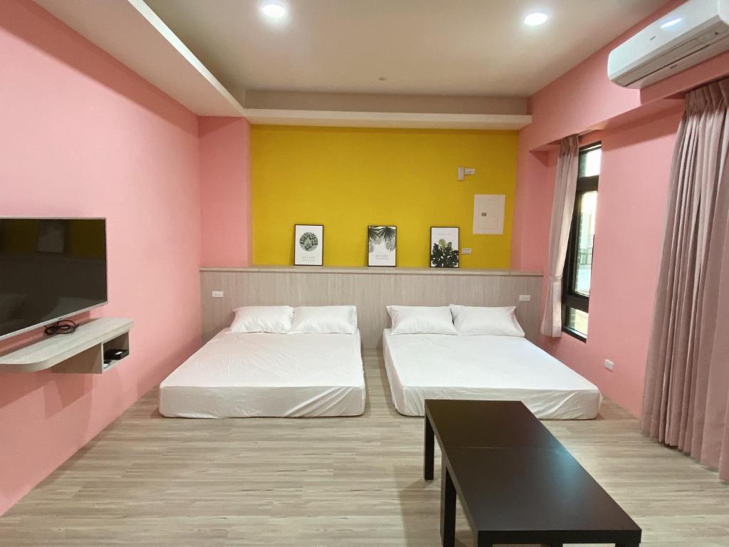 Postel nebo postele na pokoji v ubytování Enjoy House