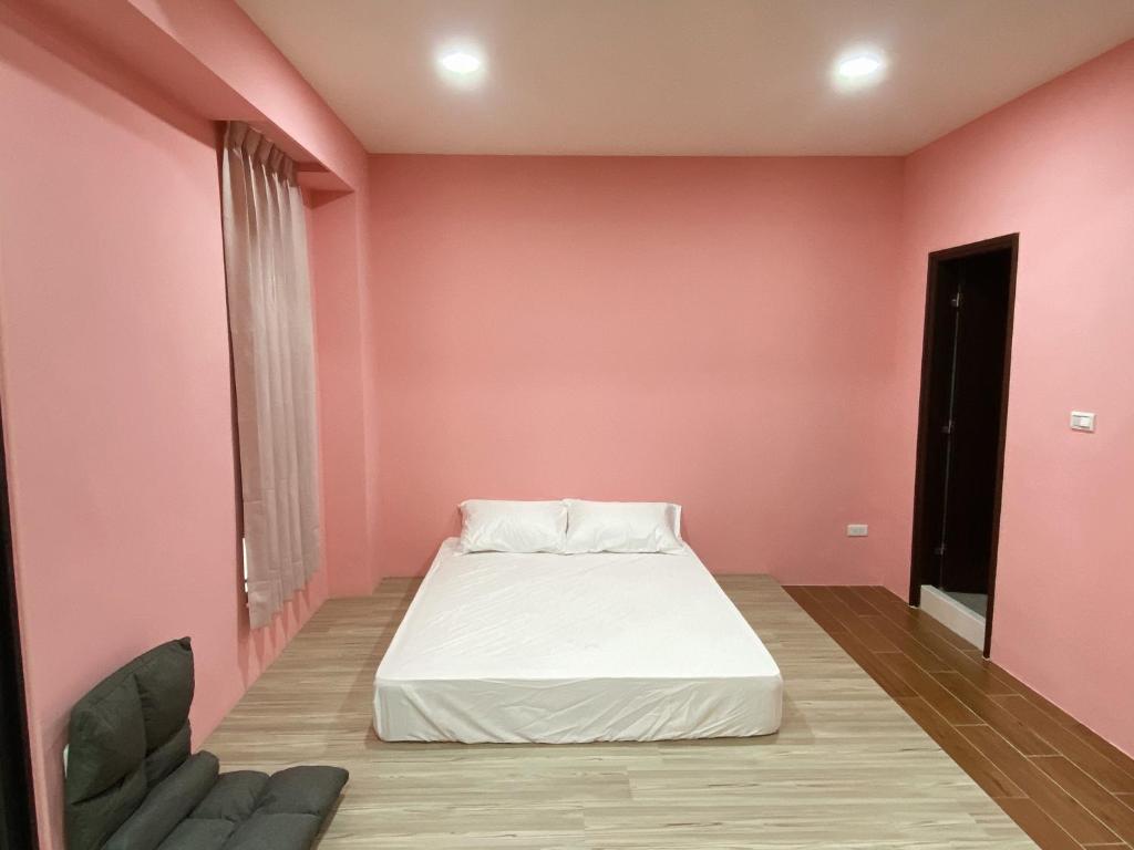 Postel nebo postele na pokoji v ubytování Enjoy House