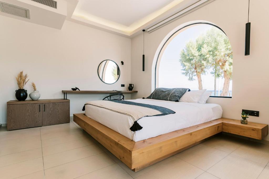 Postel nebo postele na pokoji v ubytování Villa Di Mare Seaside Suites