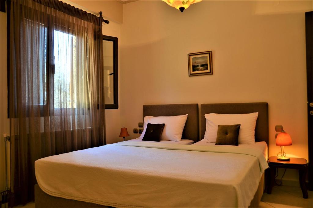 Voodi või voodid majutusasutuse Pagiatakis Suites toas