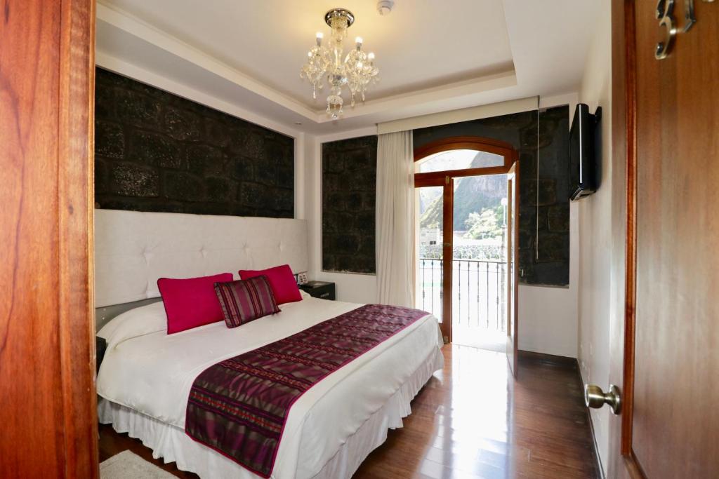 Postel nebo postele na pokoji v ubytování Sangay Spa Hotel