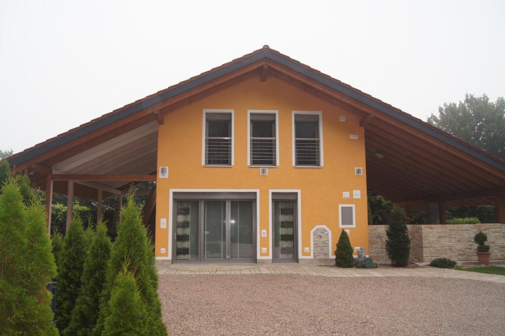 a large orange house with a large door at Passau "Am Sulzsteg" 9 in Passau