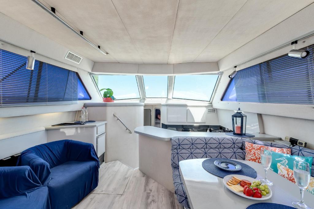 a kitchen and a table in a boat at Infinity Yacht in Downtown St Augustine in St. Augustine