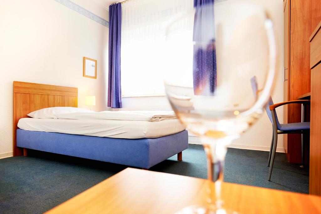 Postel nebo postele na pokoji v ubytování Haus Niemann