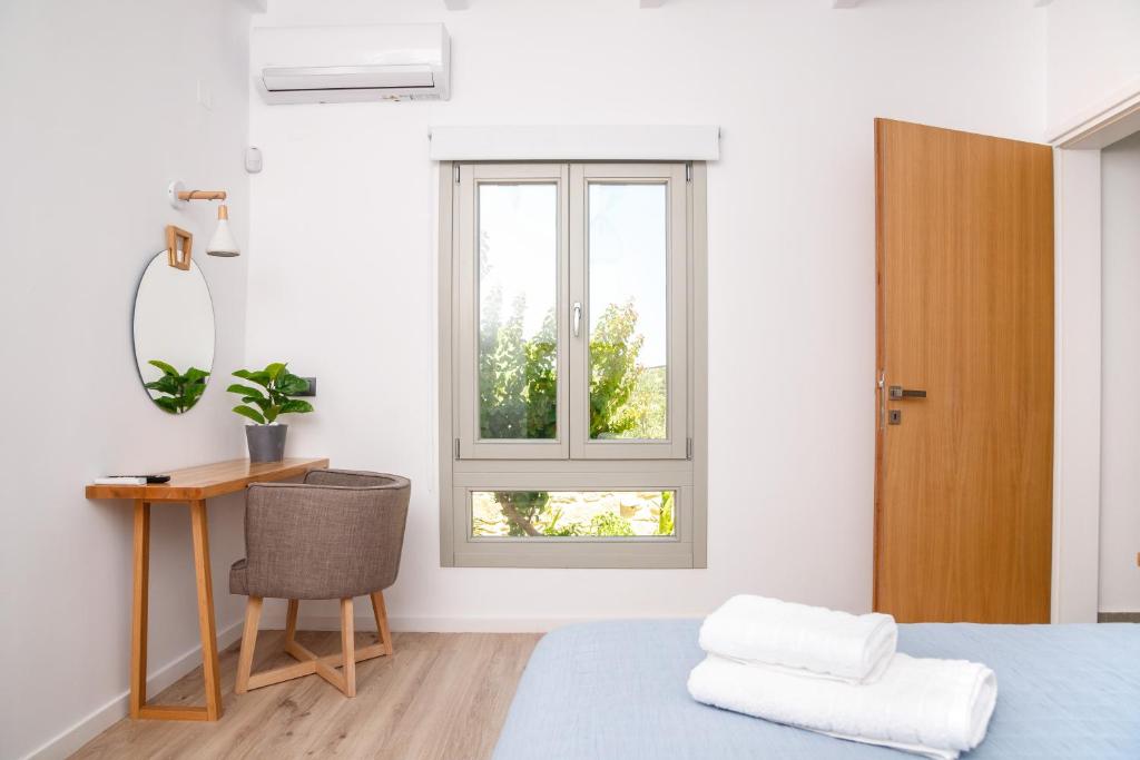 Postel nebo postele na pokoji v ubytování Villa Evrithea